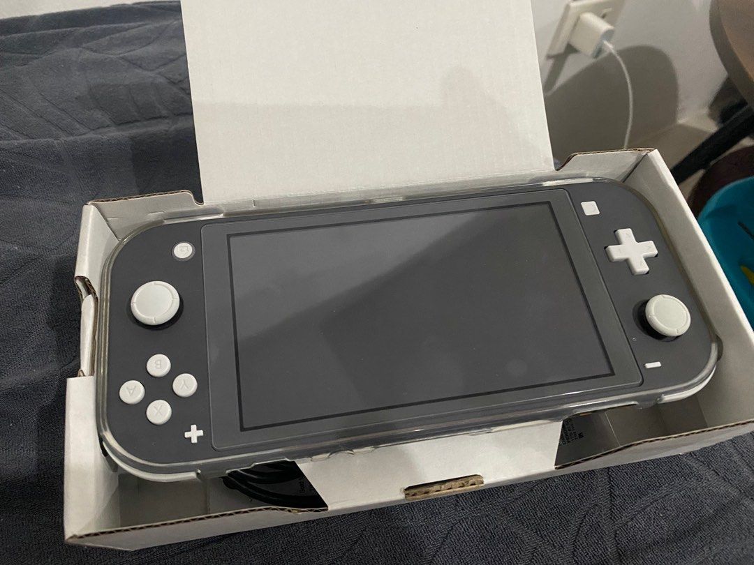 Nintendo Switch Lite (Category: Nintendo) located in General Trias. Submitted by absolutefab (Listing ID 1241730122, Image 2). Description: Bought last June 06, 2023 RFS: Bought a new switch OLED NO GAMES includes *Unit *Charger *Box Location: General Trias Cavite.