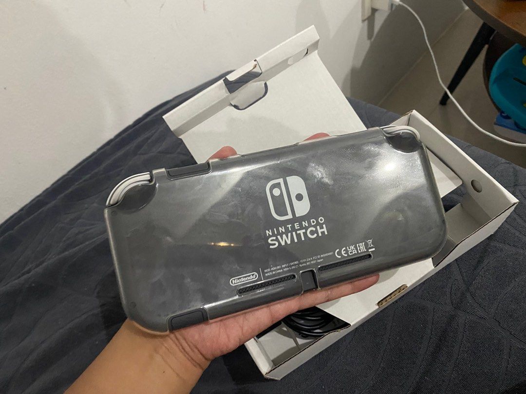 Nintendo Switch Lite (Category: Nintendo) located in General Trias. Submitted by absolutefab (Listing ID 1241730122, Image 3). Description: Bought last June 06, 2023 RFS: Bought a new switch OLED NO GAMES includes *Unit *Charger *Box Location: General Trias Cavite.