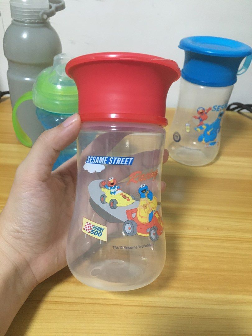 Bundle Nuby Sippy Cup and Sesame Street Training Cup (Category: Breastfeeding & Bottle Feeding) located in Quezon City. Submitted by ziannag (Listing ID 1241680434, Image 2). Description: Nuby Sippy Cup used once or twice Sesame Street Training Cup never used Free Tumbler.