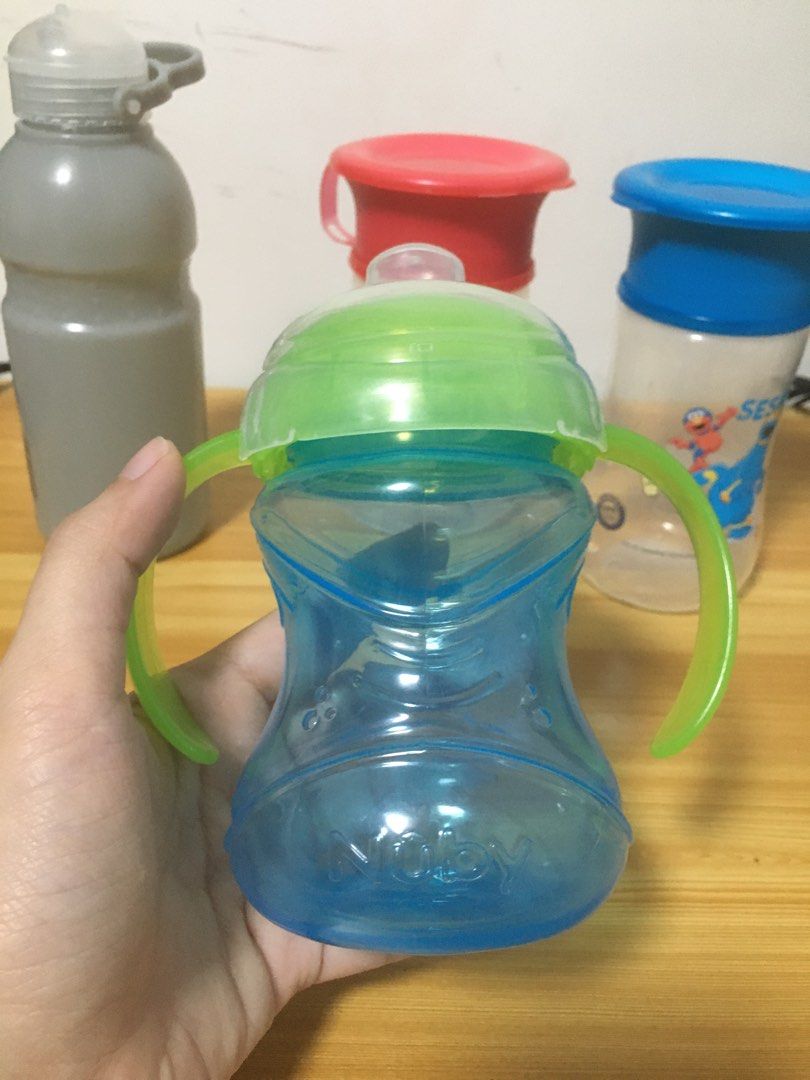 Bundle Nuby Sippy Cup and Sesame Street Training Cup (Category: Breastfeeding & Bottle Feeding) located in Quezon City. Submitted by ziannag (Listing ID 1241680434, Image 3). Description: Nuby Sippy Cup used once or twice Sesame Street Training Cup never used Free Tumbler.