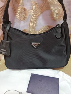 Prada Re-Edition 2005 Saffiano leather Multi Pochette, Luxury, Bags &  Wallets on Carousell