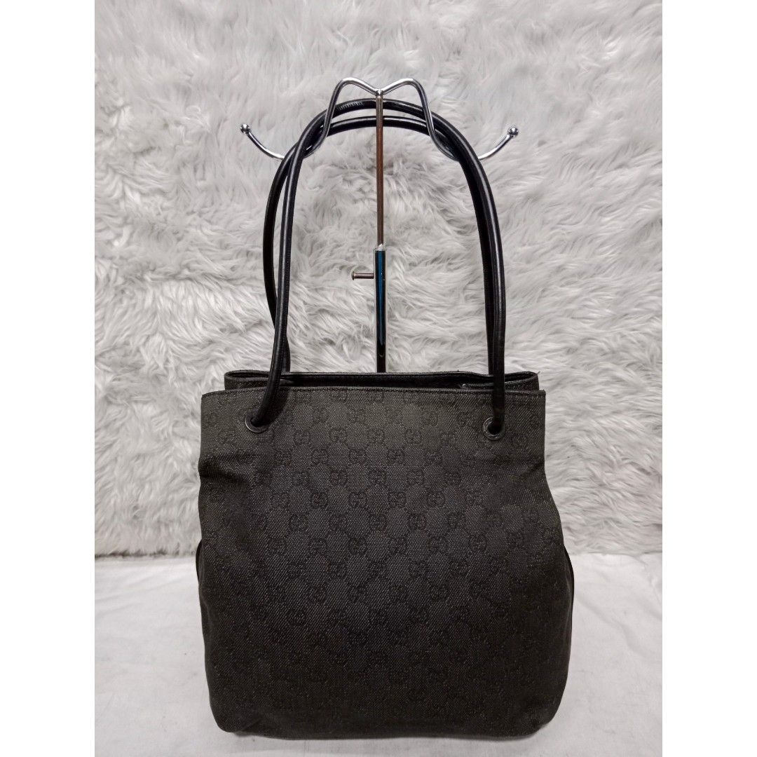 Authentic Gucci Black GG Monogram Shoulder Bag (Category: Luxury Bags & Wallets) located in Caloocan City. Submitted by sassypurchased (Listing ID 1241817359, Image 1). Description: Authentic Gucci Black GG Monogram Shoulder Bag 7,999 Must have! Good condition, minimal sign of usage From Japan Preloved Shop NOT UKAY SOURCE NO HAGGLING PLS H-12 L-15 W-4.5 inches approx Handle Drop:9 inches approx COD available, Shopee checkout: shopee.ph/sassy_pur