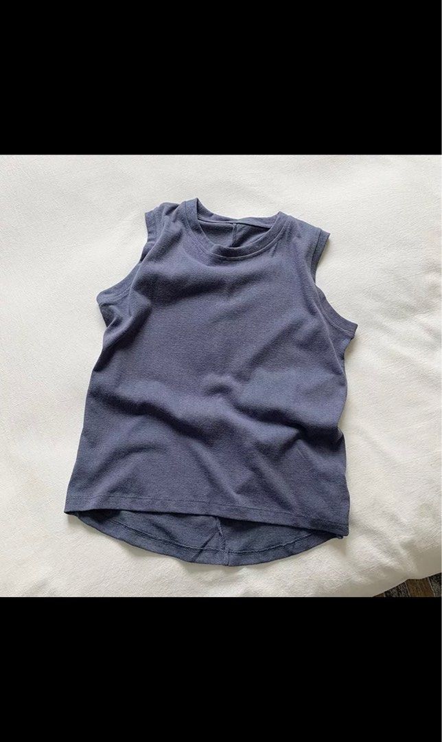 Basic Solid Blue Tank Top (Category: Sleeveless) located in Singapore. Submitted by celine.lhs (Listing ID 1241933493, Image 1). Description: Size: free size can fit S/M Material: thing cotton, suitable for hot weather Condition: 10/10, worn once only.