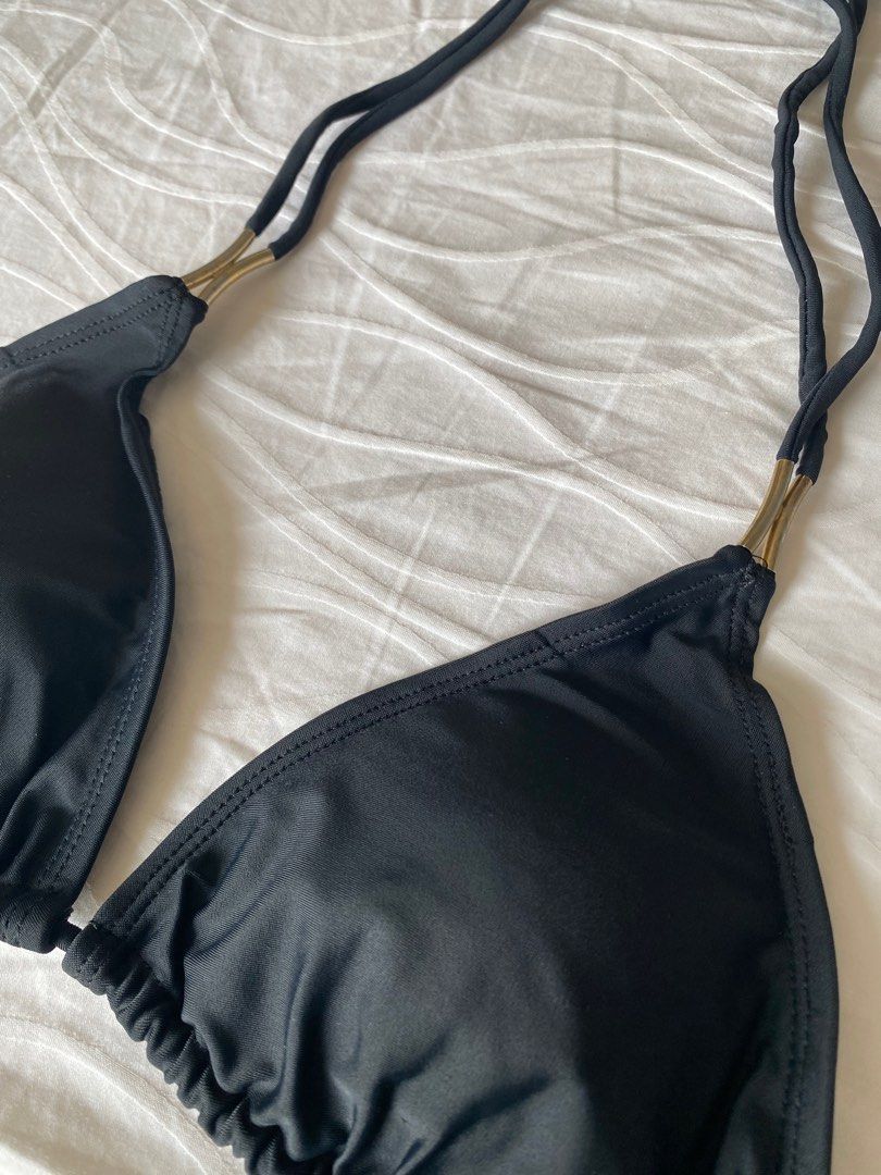 Bikini (Category: Bikinis & Swimsuits) located in Quezon City. Submitted by inxshop (Listing ID 1241814085, Image 3). Description: No brand Simple black bikini but the strings & accent make it classy & elegant Size is S but will fit XS to S petite frames.