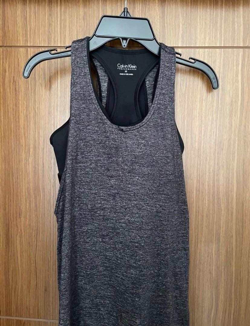 1 set Calvin Klein Performance Tshirt and Leggings, Women's Fashion, Tops,  Shirts on Carousell