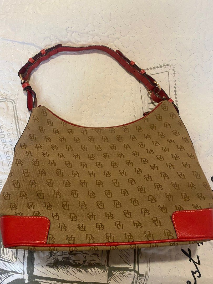 Dooney & Bourke Bag (Category: Luxury Bags & Wallets) located in Santo Tomas. Submitted by nicsdecluttering (Listing ID 1241774729, Image 2). Description: - Authentic - negotiable - still in good condition - if you have more inquiries send me a message! .