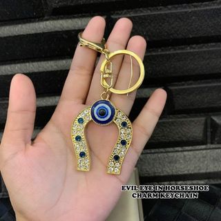 Evil eye in horseshoe keychain
