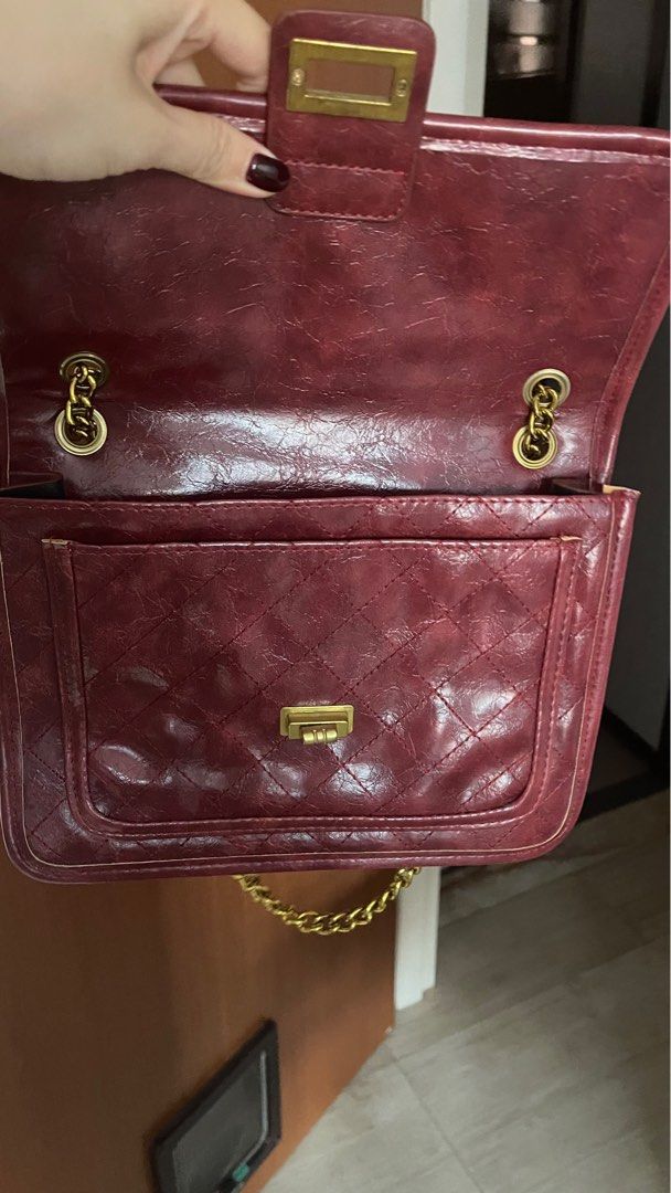 Red bag with gold chain top