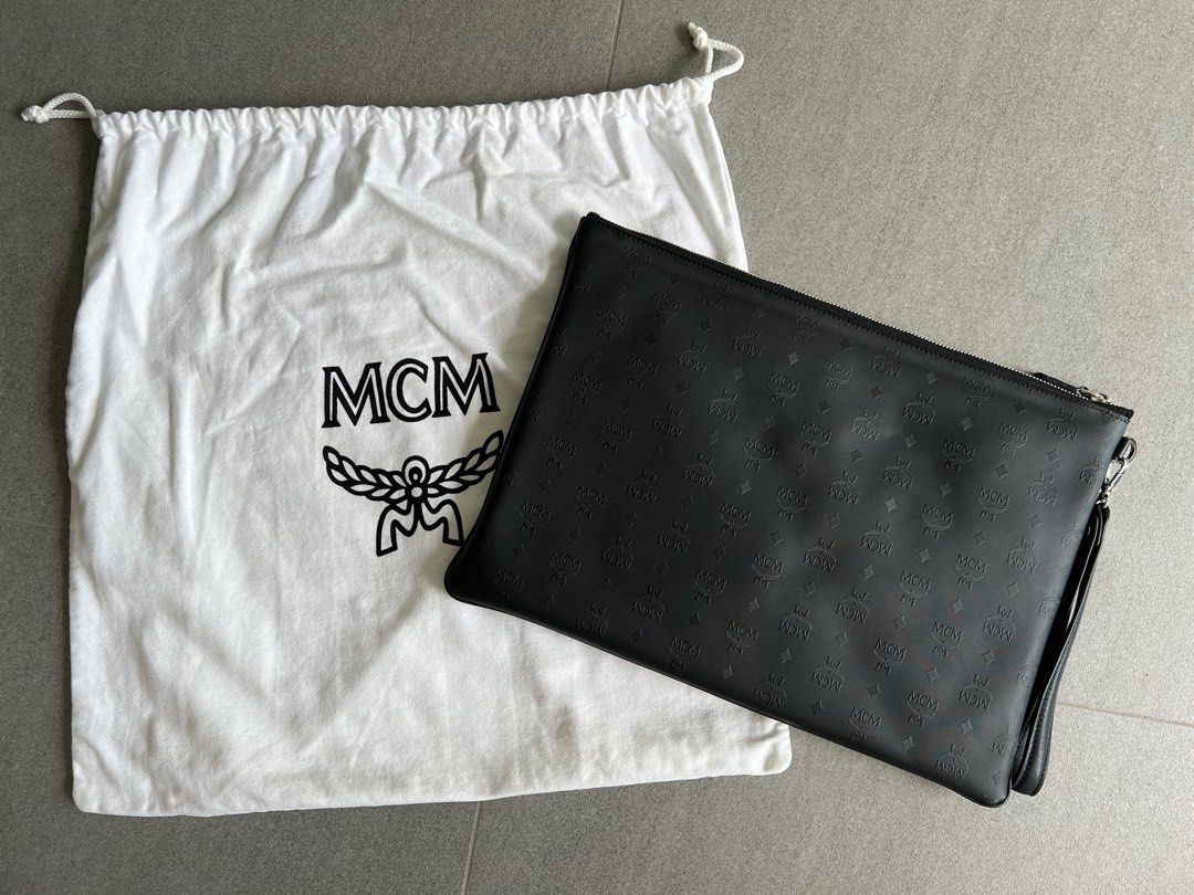 Mcm black discount clutch bag