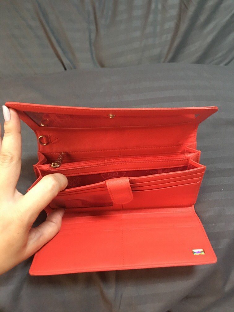ORIGINAL DAKS BIFOLD FEMALE WALLET on Carousell