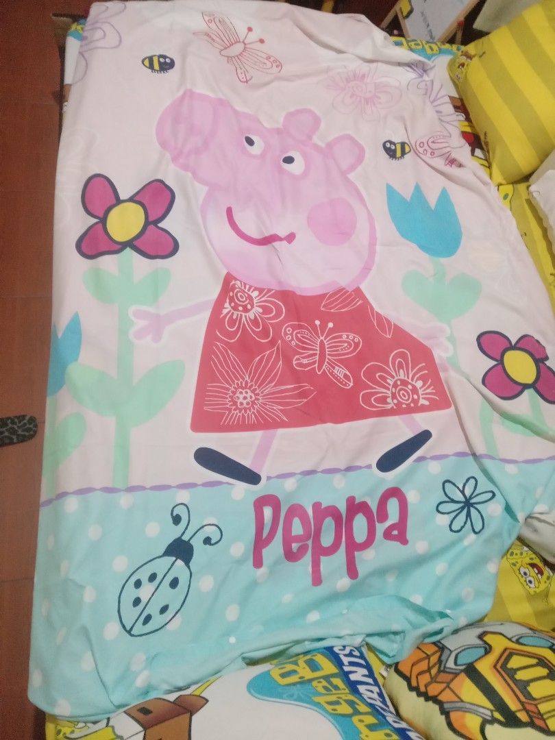 Peppa Pig bedsheet (Category: Bed Guards) located in Imus. Submitted by dahdahlicious (Listing ID 1241877698, Image 1). Description: hindi na gagamit bought from new zealand.