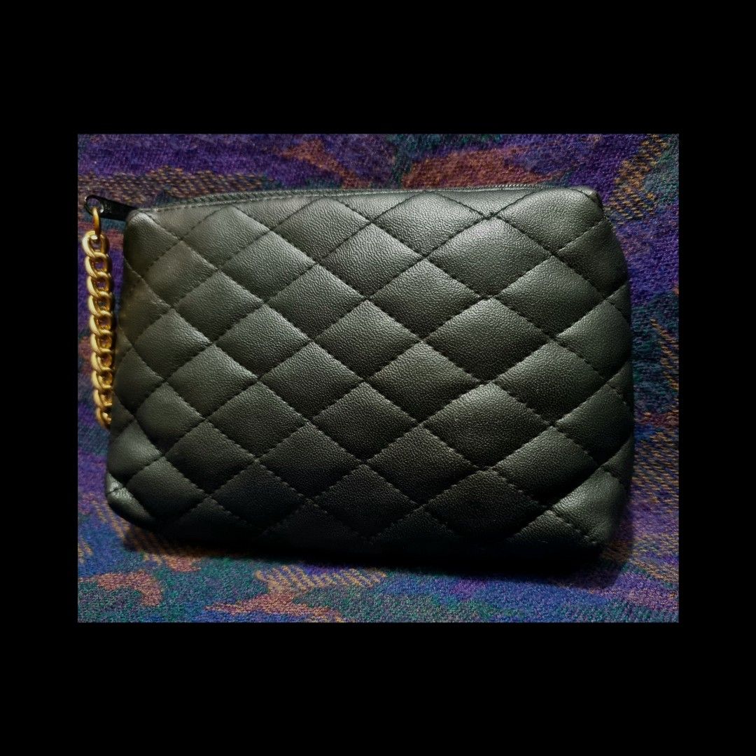Quilted Pouch with Brass Semi Wristlet (Category: Luxury Bags & Wallets) located in Rizal. Submitted by roccini (Listing ID 1241881256, Image 2). Description: Quilted Pouch with Brass Semi Wristlet Japan Sourced No issue BEST Zipper No technical issues on its zipper No rubs, tears, and loose threads Interior is clean Dimension is approximately 7.5"L x 5.5"H.