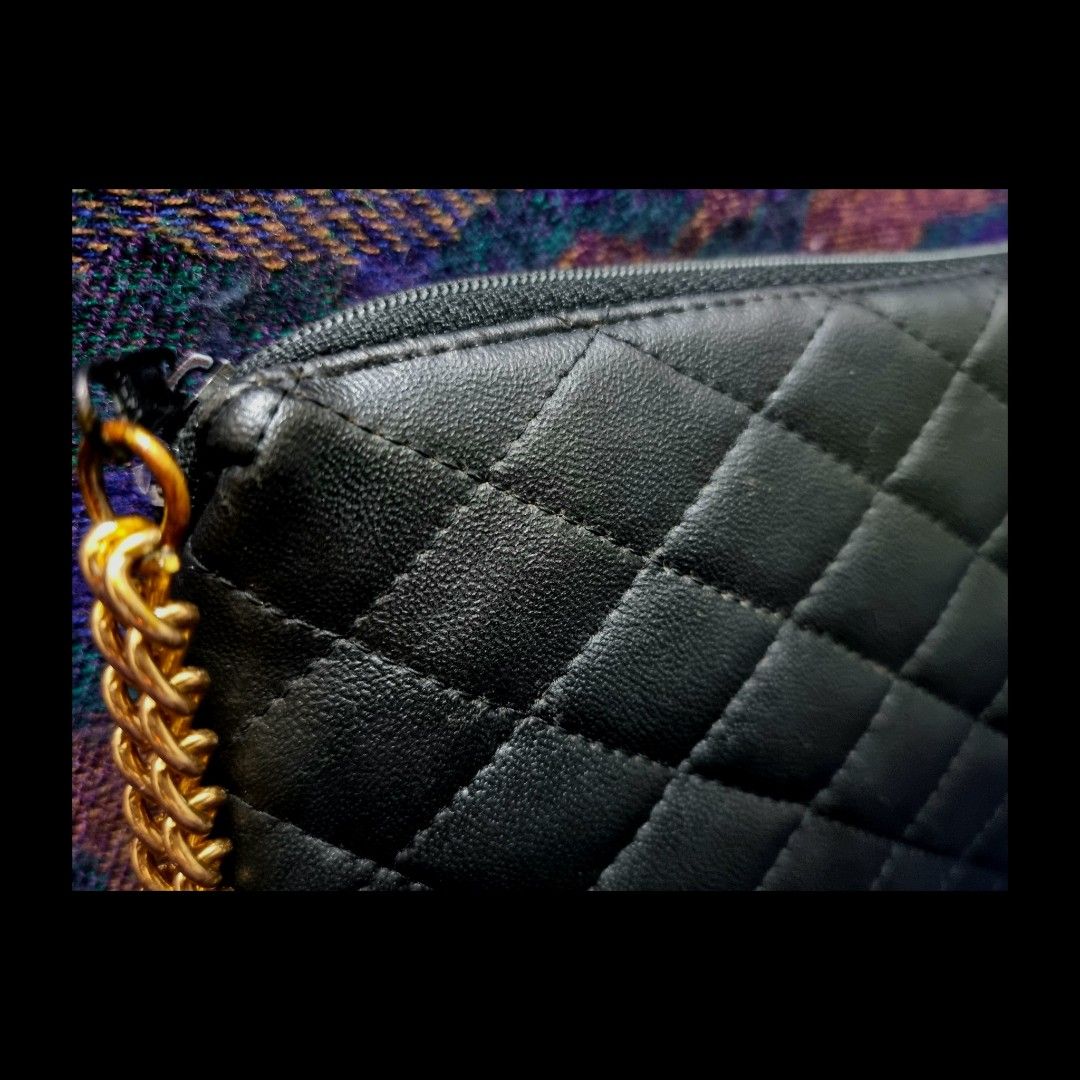 Quilted Pouch with Brass Semi Wristlet (Category: Luxury Bags & Wallets) located in Rizal. Submitted by roccini (Listing ID 1241881256, Image 3). Description: Quilted Pouch with Brass Semi Wristlet Japan Sourced No issue BEST Zipper No technical issues on its zipper No rubs, tears, and loose threads Interior is clean Dimension is approximately 7.5"L x 5.5"H.