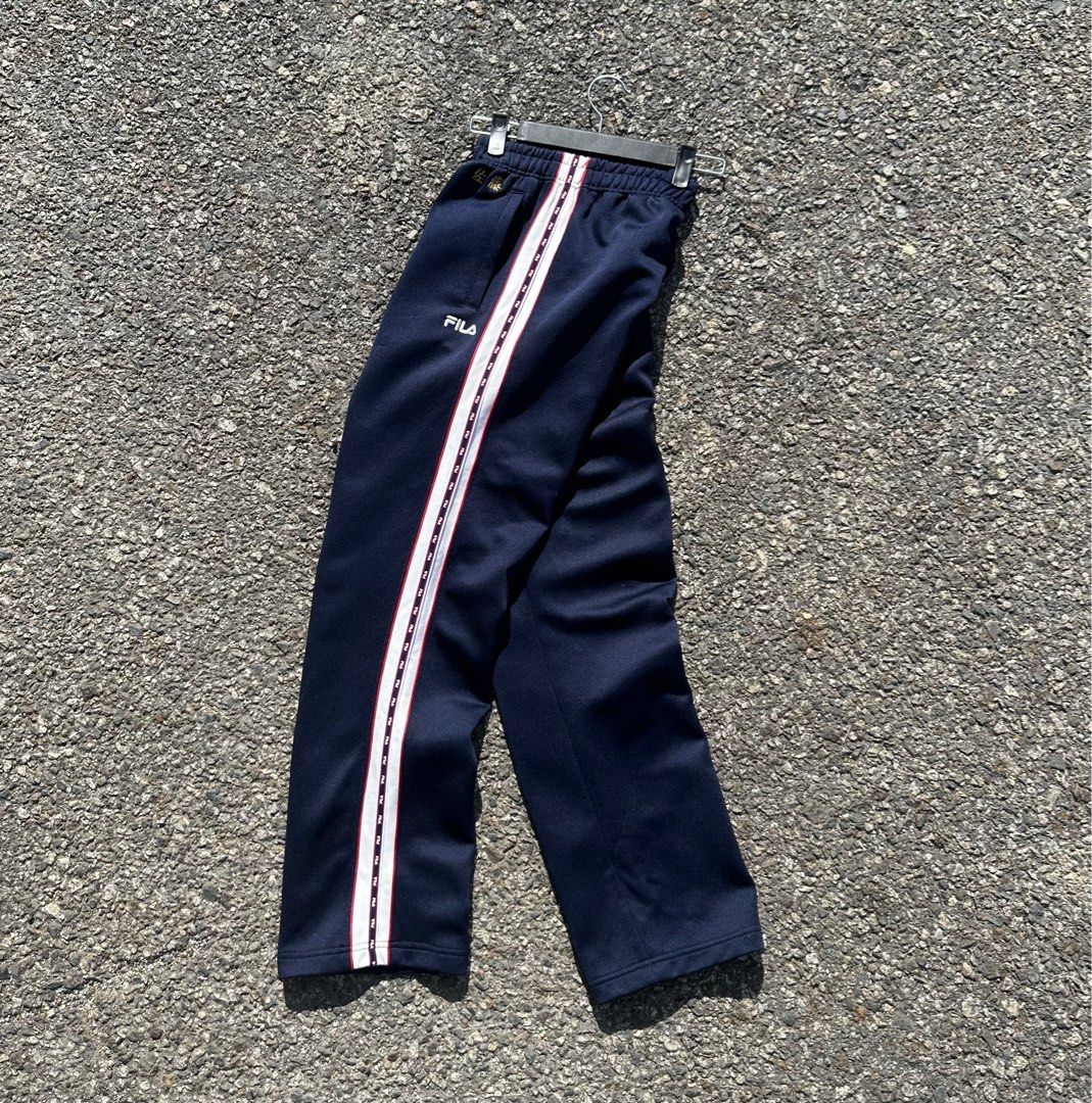 Fila tracksuit bottoms with side new arrivals stripe
