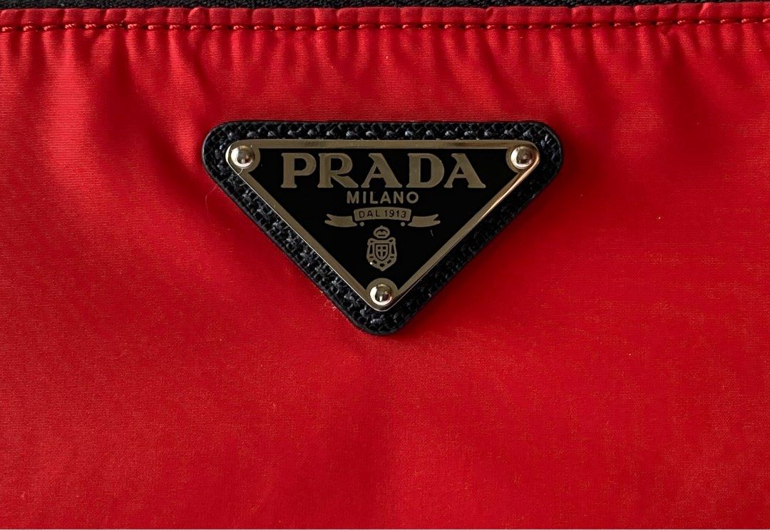 Prada large hotsell padded nylon clutch