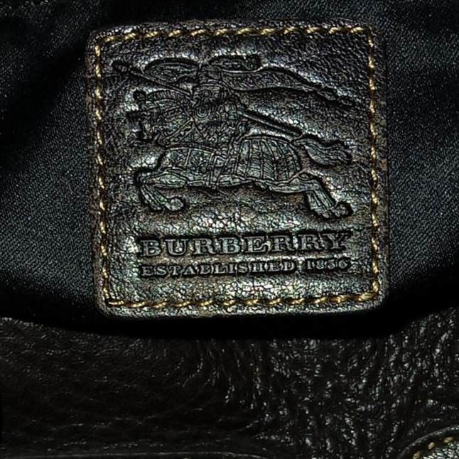 Burberry Brown Boston Type Bag (Category: Luxury Bags & Wallets) located in Taguig. Submitted by esa.agustin (Listing ID 1242029037, Image 3). Description: Original Burberry browm leather boston type shoulder bag. With dust bag. Measurement: Height - 7 inches; Length- 13.3 inches; Width - 8.6 inches.