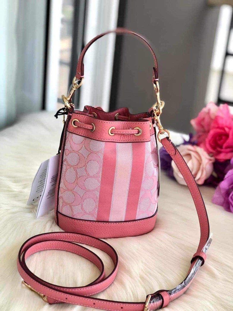 Coach Mini Dempsey Bucket Bag (Category: Luxury Bags & Wallets) located in Rizal. Submitted by LuxbyMarifrance (Listing ID 1241947474, Image 3). Description: 🏷️ 2,400 only + SF 💼 COACH MINI DEMPSEY BUCKET BAG IN SIGNATURE JACQUARD WITH STRIPE AND COACH PATCH 📏 51/2” (L) × 6 1/2” (H) × 3 1/2” (W) 📌 with dust bag and paper bag ✨All trademarks, logos and brand names are reserved and property of the original brand owners. #coachph #authenticquali