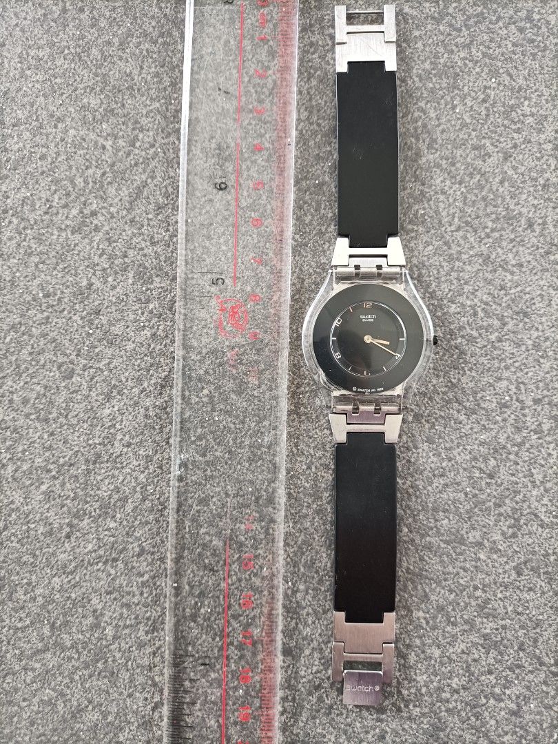 Swatch cheap total black