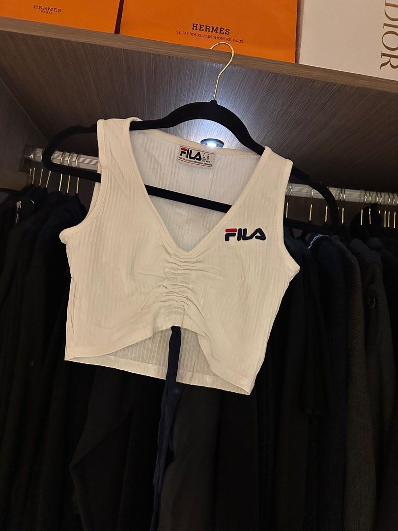 Fila Crop Top (Category: Others Tops) located in Baguio. Submitted by kimstyleessentials (Listing ID 1242142709, Image 1). Description: Used once. So chic and cute. Pang Gen Z 💕 Can fit small - Medium.