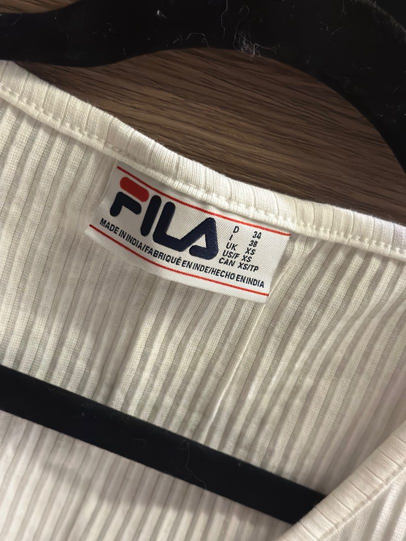 Fila Crop Top (Category: Others Tops) located in Baguio. Submitted by kimstyleessentials (Listing ID 1242142709, Image 2). Description: Used once. So chic and cute. Pang Gen Z 💕 Can fit small - Medium.