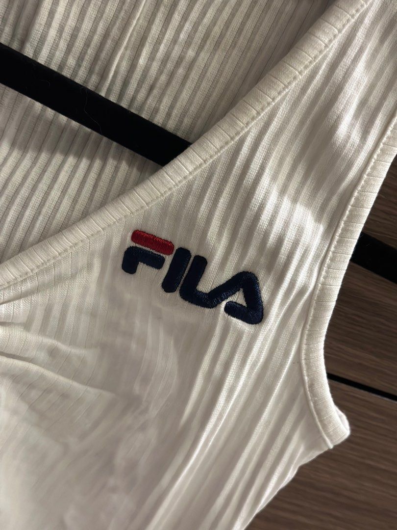 Fila Crop Top (Category: Others Tops) located in Baguio. Submitted by kimstyleessentials (Listing ID 1242142709, Image 3). Description: Used once. So chic and cute. Pang Gen Z 💕 Can fit small - Medium.
