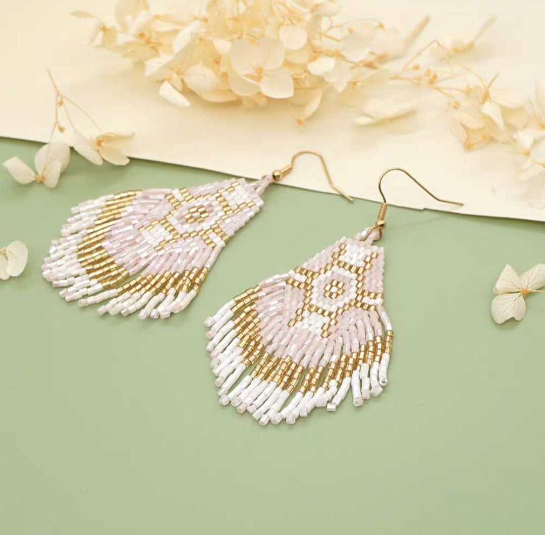 White beaded outlet drop earrings
