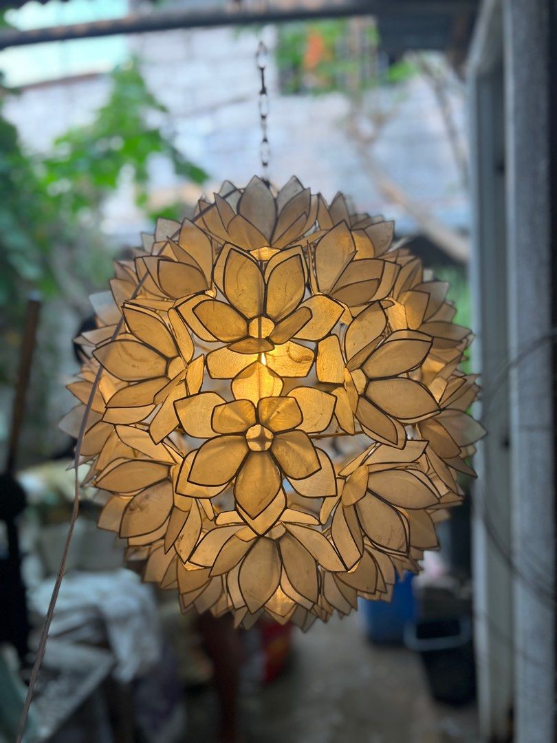 Lotus capiz pendant light (Category: Lighting) located in Caloocan City. Submitted by casadisenyo (Listing ID 1242063901, Image 3). Description: MADE TO ORDER LEAD TIME: 10-15days after downpayment LOTUS CAPIZ PENDANT LIGHT SIZE: 18" We customized other design & size of capiz chandeliers Message me for inquiries .