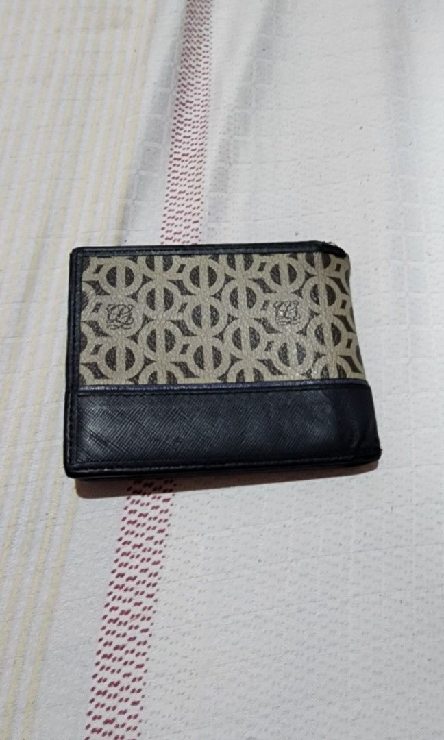 Louis Quatorze LQ short wallet (Category: Wallets & Card Holders) located in Cebu City. Submitted by rhea20ph (Listing ID 1241947393, Image 2). Description: pre loved item FLAW: with little crack on side part leather material unisex item plus sf.