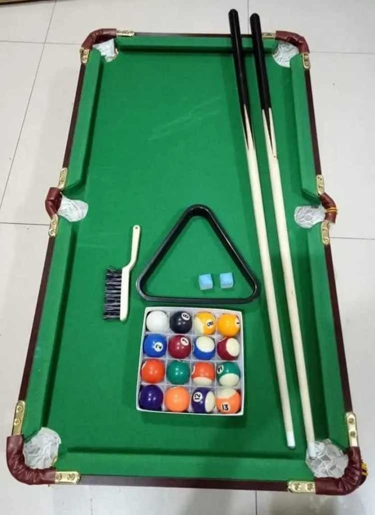 Mini Billiard Table (Category: Billiards and Bowling) located in Quezon City. Submitted by dianaibarraajoc (Listing ID 1242116461, Image 2). Description: (Length) 36 inches, (Width) 21 inches, (Height) 7 inches Complete set includes tako brush & billiard balls .