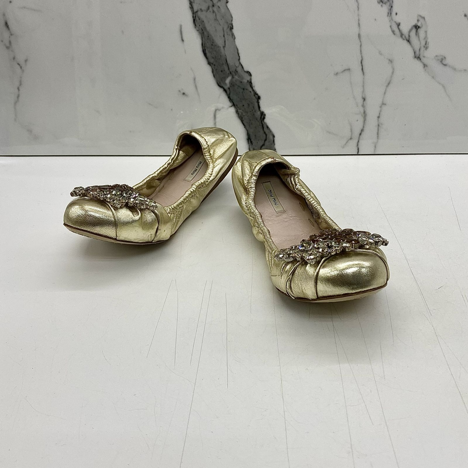 Gold embellished flats online