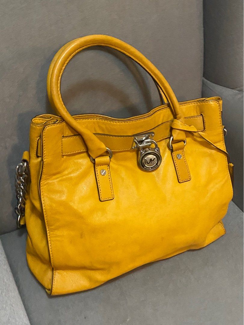 MK hamilton large soft leather (Category: Luxury Bags & Wallets) located in Marikina City. Submitted by shopmeplease_19 (Listing ID 1242023885, Image 1). Description: Used once or twice Authentic or money back Soft leather Mustard Clean inside and out No flaws Just stck in my room.