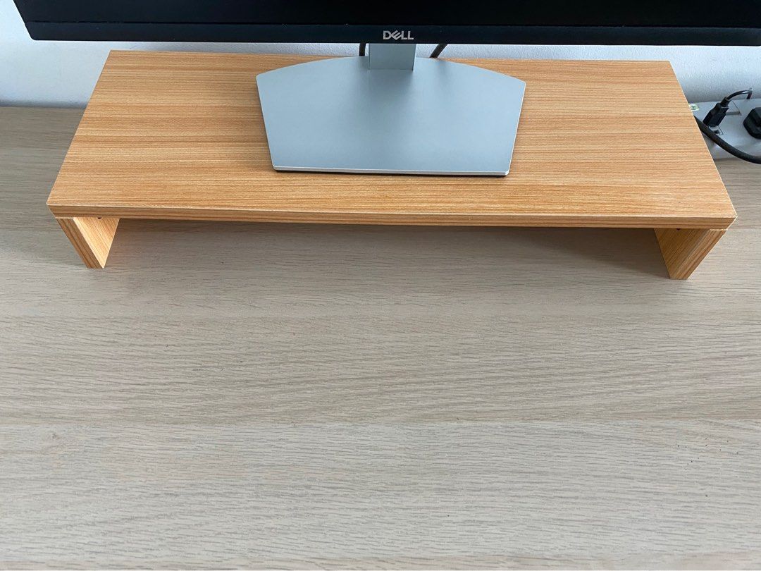 Monitor stand (Category: Shelves, Cabinets & Racks) located in Kuala Lumpur. Submitted by nutmeg.cinnamon (Listing ID 1241997483, Image 2). Description: -Monitor stand to let go for good -Lightly used and condition is 9.5/10 (don’t worry, it’s sturdy!) -Reason to sell: want to keep my workspace as minimal as possible -Might consider letting go for free if you buy any item from my latest listing (given that the item is still available).