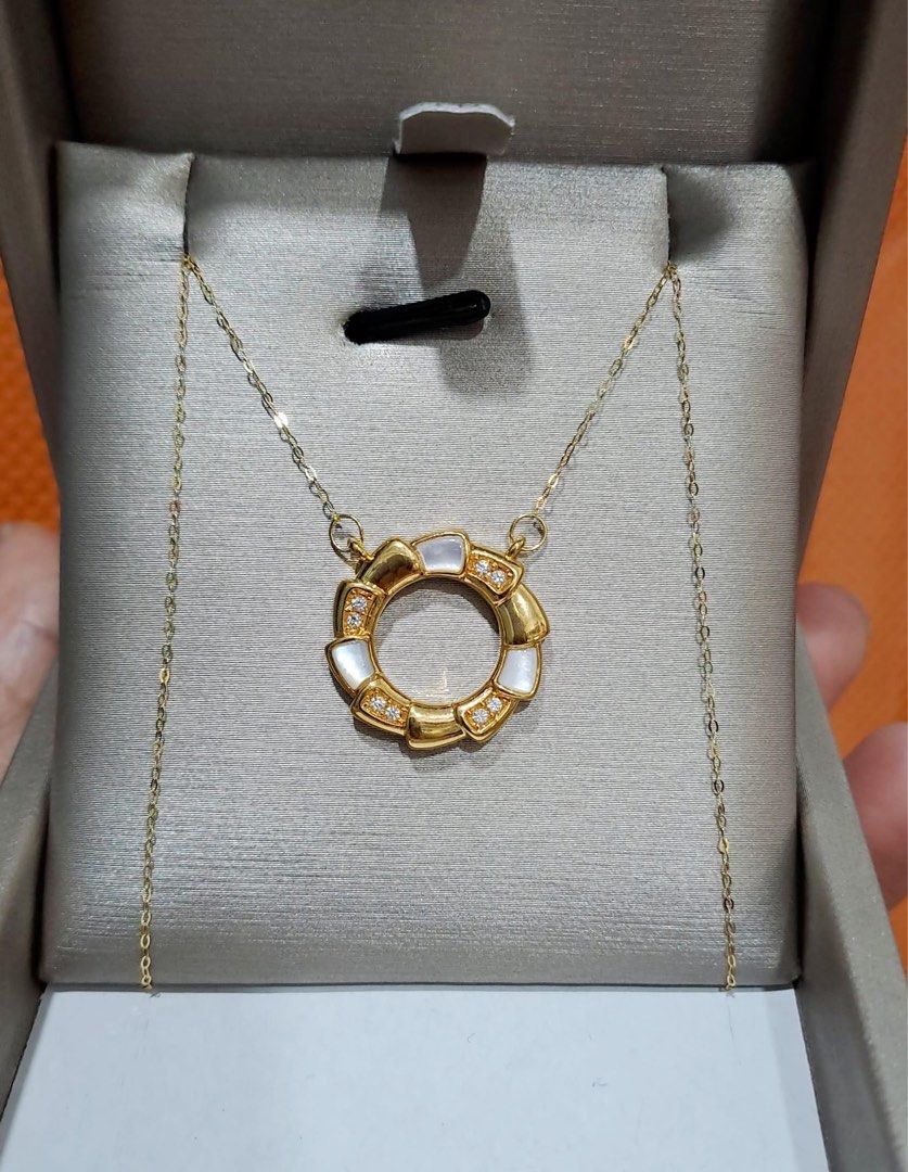 Serpentine Necklace 18Karat Gold (Category: Necklaces) located in Davao. Submitted by jewelrybox_cezsupera. (Listing ID 1242040691, Image 1). Description: P3,150 only ⭐️Serpentine Chain and Pendant ⭐️Real Gold 18Karat ⭐️Pawnable ⭐️With certificate of authenticity.