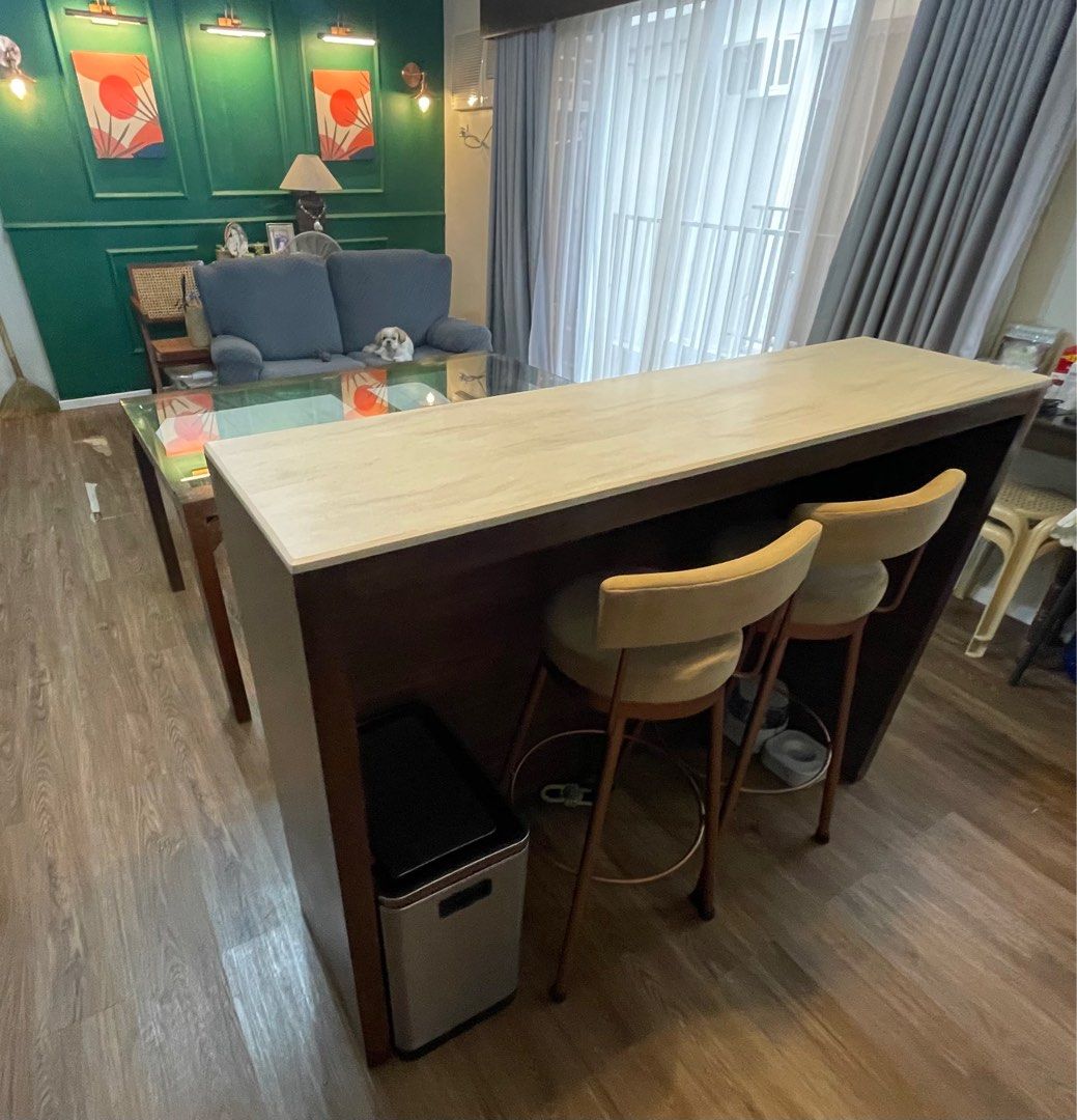 Solid Wood Dining Table with Counter (Category: Tables & Sets) located in San Juan City. Submitted by nellamij (Listing ID 1241979347, Image 2). Description: 6 seater dining table with bar table and 2 bar stools Table and bench are made of mahogany Table top is tempered glass Price is slightly negotiable Location: San Juan City .