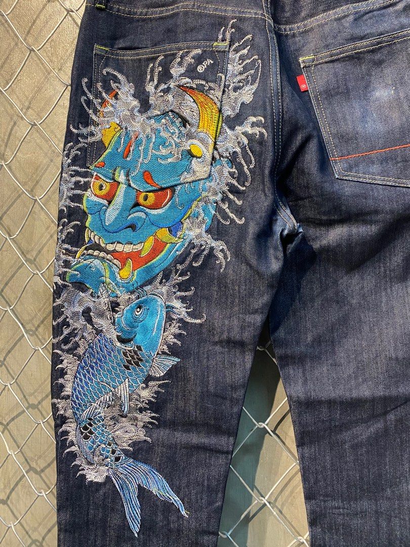 JPG tattoo jeans