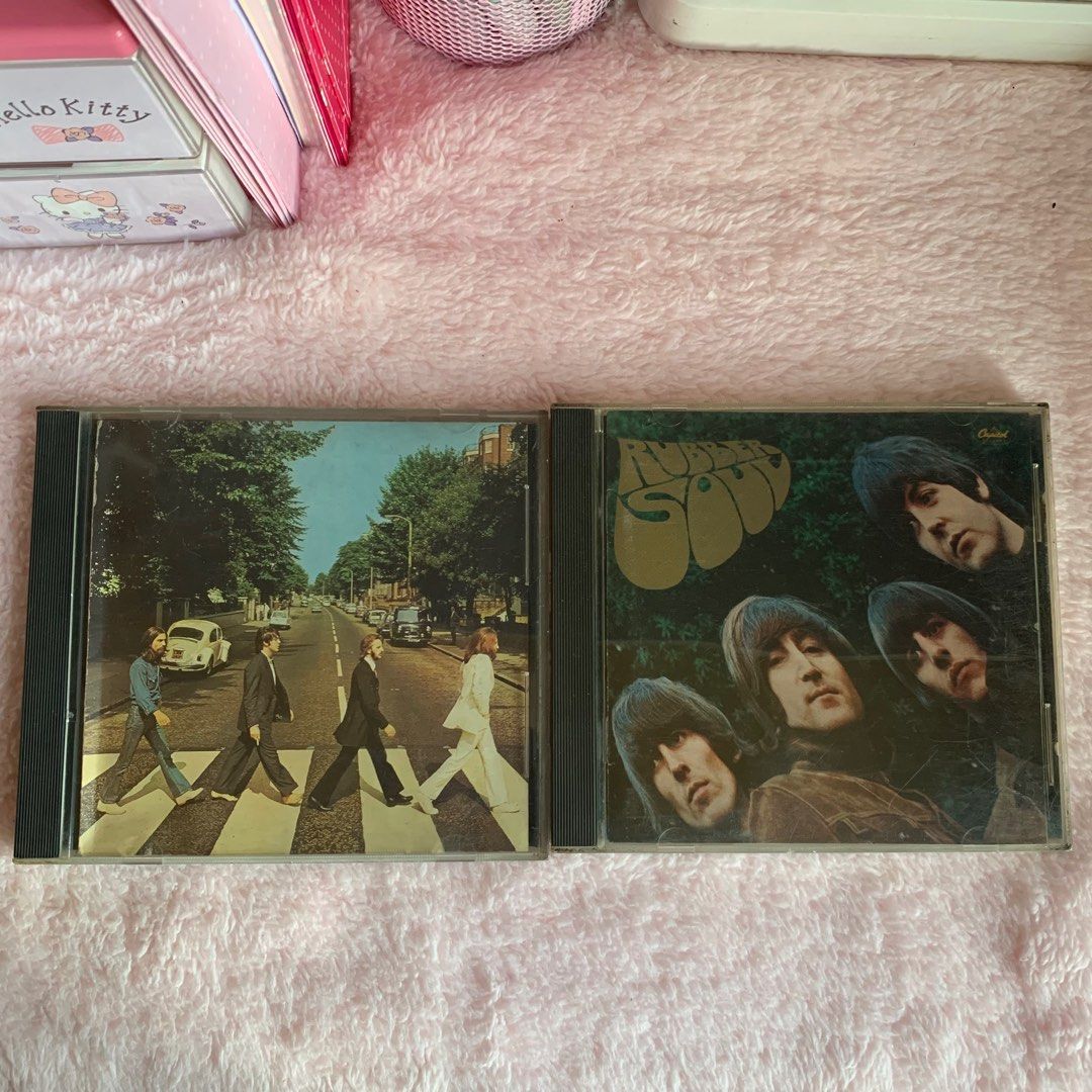 The Beatles Abbey Road & Rubber Soul CDs on Carousell