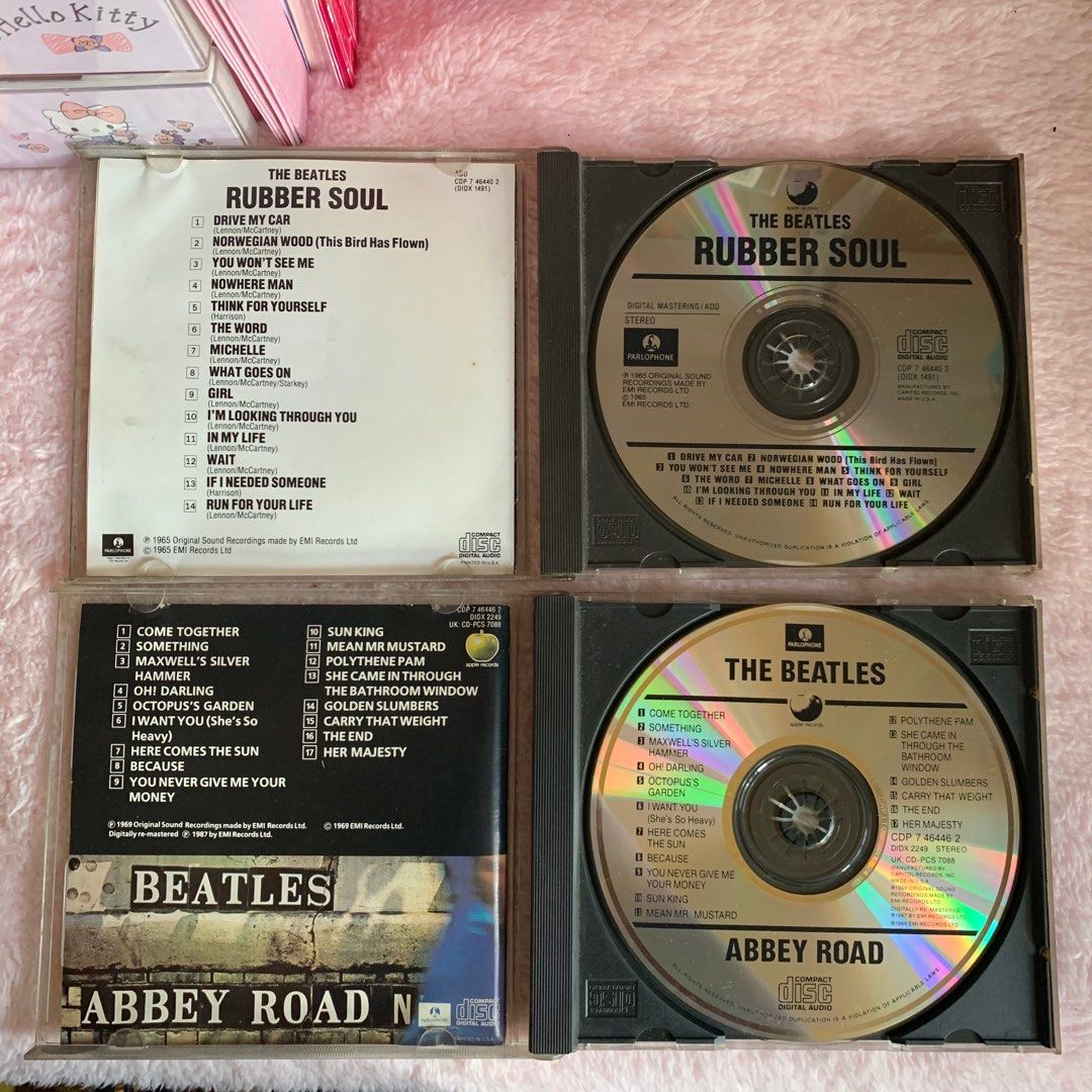 The Beatles Abbey Road & Rubber Soul CDs on Carousell