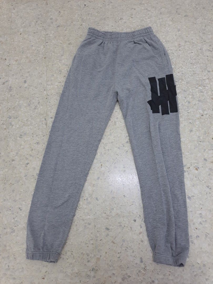 Undefeated sweatpants top