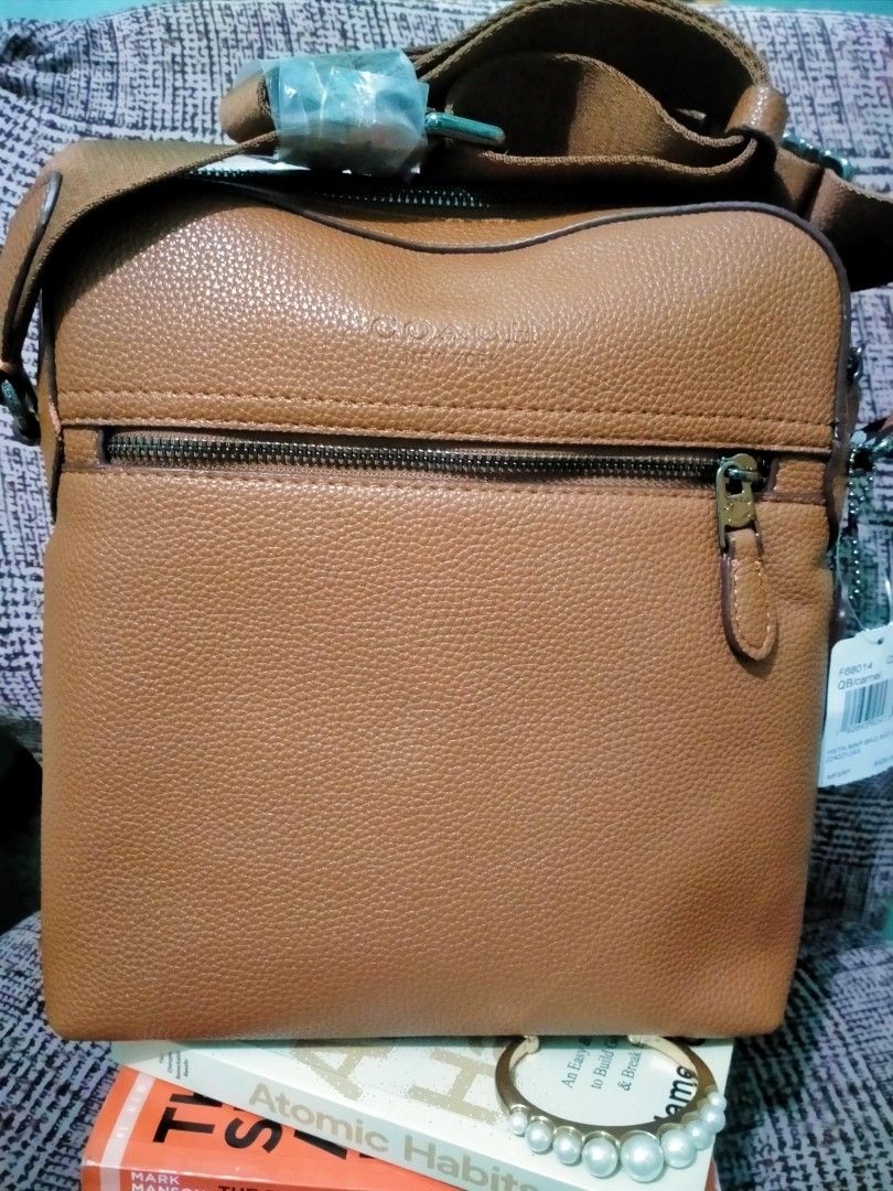 Authentic Vietnam Coach (Category: Sling Bags) located in Pasay City. Submitted by maljake (Listing ID 1246536876, Image 1). Description: °Classy and Smooth leather °with dust bag °receipt.