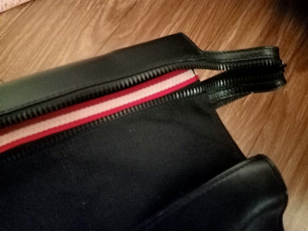 Bally Zibello pouch (Category: Luxury Bags & Wallets) located in Davao. Submitted by athenaprelovedph (Listing ID 1246540280, Image 2). Description: authentic genuine leather with canvas material clutch/pouch.