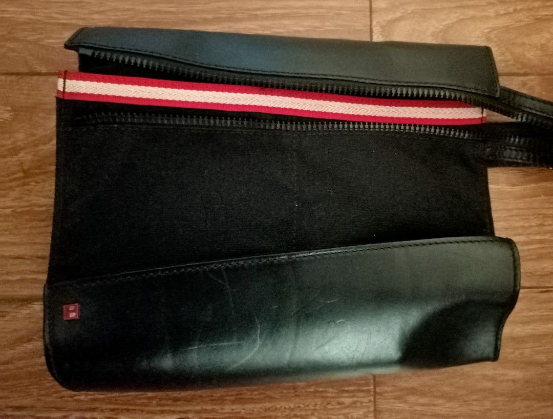 Bally Zibello pouch (Category: Luxury Bags & Wallets) located in Davao. Submitted by athenaprelovedph (Listing ID 1246540280, Image 1). Description: authentic genuine leather with canvas material clutch/pouch.