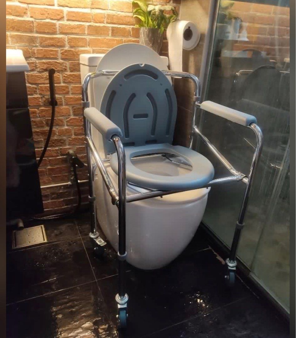 Brand New Commode with wheels comes with free portable urinal bottle