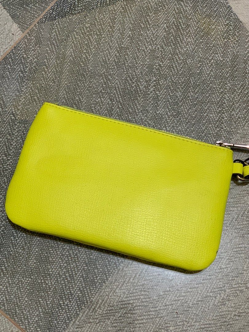 Karl Lagerfeld Maybelle Wristlet Pouch (Category: Purses & Pouches) located in Tagaytay City. Submitted by royal.rawrmeow (Listing ID 1246558105, Image 3). Description: Karl Lagerfeld’s pouch has vibrancy and allure. Styled to attract attention, it features the iconic ‘Maybelle’ graphic on the front to entice lovers of the brand. Top zip closure Silvertone hardware Lining: Textile Synthetic Imported SIZE Synthetic handle, 7” drop 10”W x 5.5”H x 0