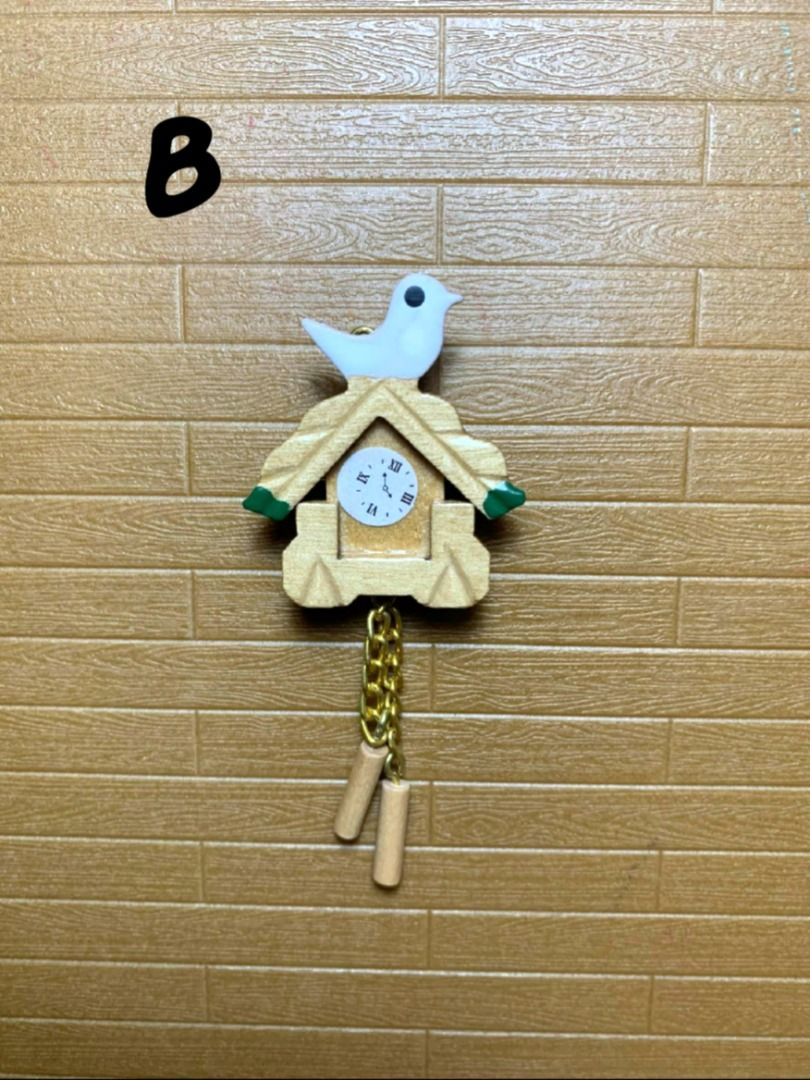 Miniature Wall Clock (Category: Clocks) located in Pasig City. Submitted by paisleybox (Listing ID 1246507401, Image 2). Description: Miniature 1/12 scale Wall Clock A. 200 ea- Brown & black round (D- 3.3cm) B. 300 ea- Brown wood (L- 5.5 cm) SOLD C. 300 - Cuckoo clock wood including pull chain (L- 7.5cm) Payment: BDO, GCash Cross posted.