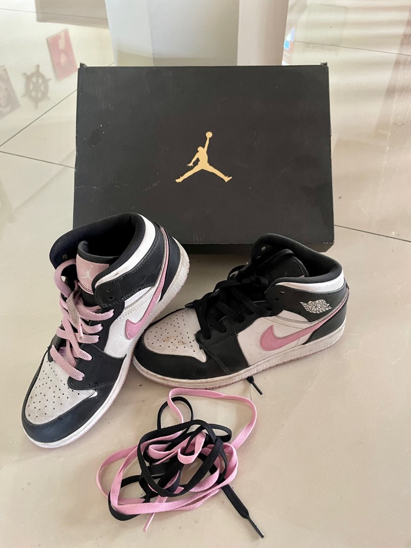 black and light pink jordans