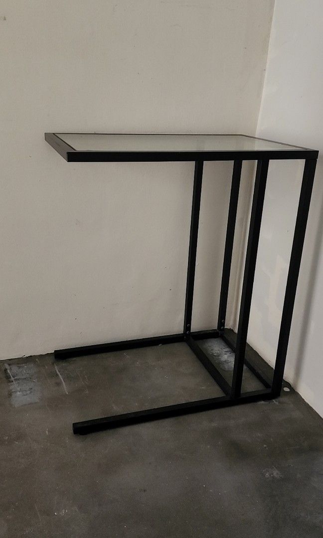 Side Table (Category: Tables & Sets) located in Singapore. Submitted by jojojogets (Listing ID 1246413512, Image 1). Description: beautifully constructed metal end table with a piece of removable glass panel top. feel free to replace with any other materials to your liking :) metal frames are approximately 2 cm in thickness. table is relatively light as well. dimensions width: 56cm depth: 35cm height: 64cm self collection, please!.