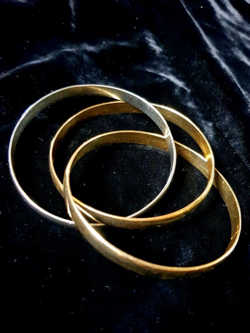 Triple Intertwined 2 Gold and 1 Silver Bangles Bracelet (Category: Bracelets) located in General Trias. Submitted by silverstar1221 (Listing ID 1246401204, Image 1). Description: Item Name: Triple Intertwined 2 Gold and 1 Silver Bangles Bracelet Item Description: • Bought from Japan Auction •AS-IS Rules and Policy: • No Meet Up • No COD • Shipping or Delivery Only. • No cancellation once order is placed. Please finalized your order to avoid probl