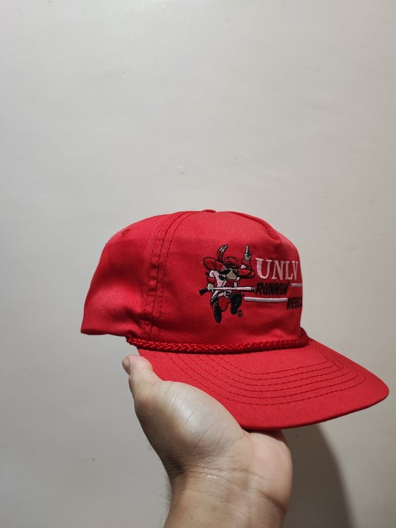 Vintage UNLV Runnin' Rebels Cap (Category: Caps & Hats) located in Makati City. Submitted by ides.ph (Listing ID 1246558180, Image 2). Description: Vintage UNLV running rebels cap Snapback one size fits all malalim ang fitting corded hat with discoloration , some portions are faded.