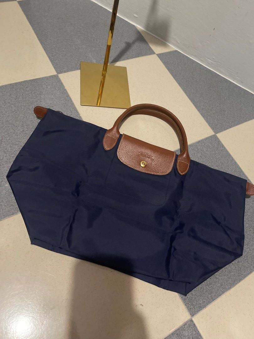 Cheapest shop longchamp bags