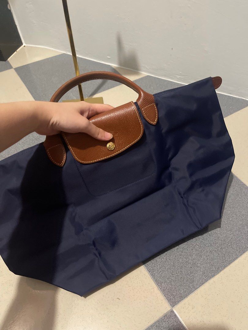 Cheapest shop longchamp bags